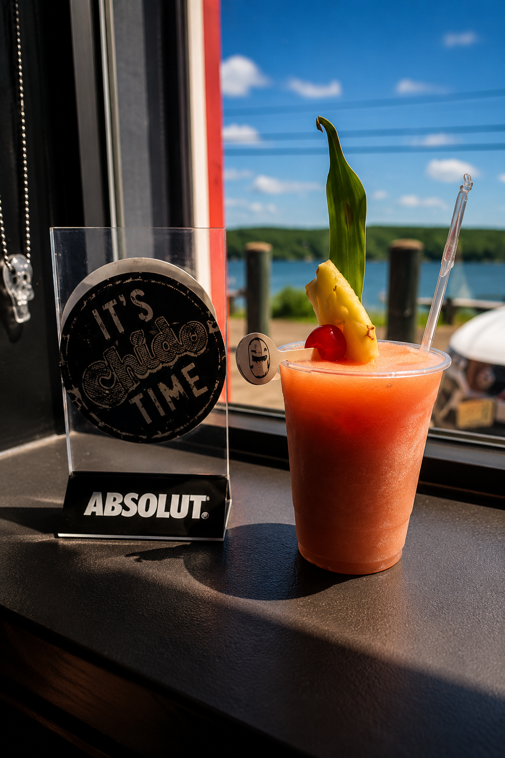 Chido Punch — house specialty frozen cocktail with pineapple garnish, served lakeside at Chido Mexican Kitchen West Milford NJ